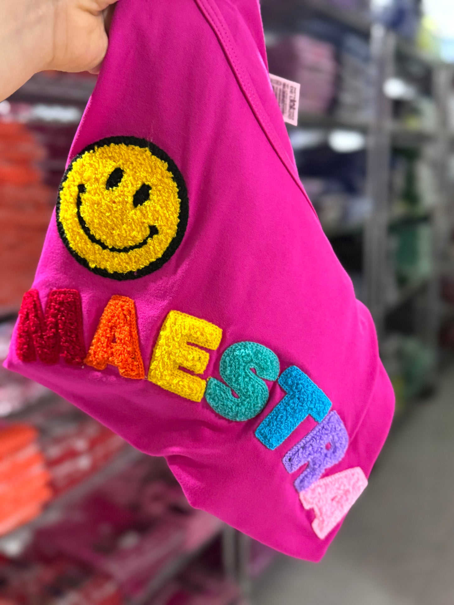 Playera bordada fucsia